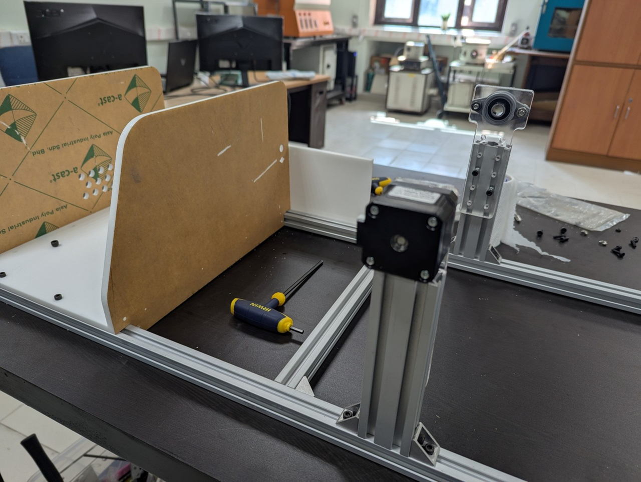 Adjustable drum height for different syringe sizes